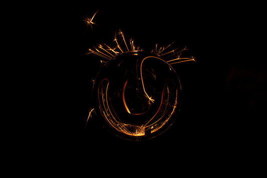 Underwater photograph exploding flower series sparks energy shot Warm Low Light tonality from the Fusion series