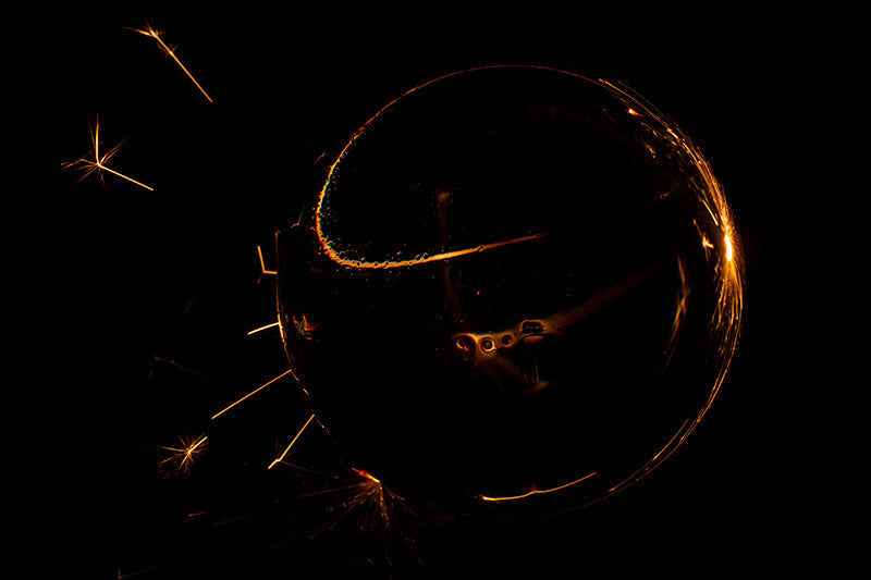 Underwater photograph exploding flower series sparks energy shot Warm Low Light tonality from the Fusion series