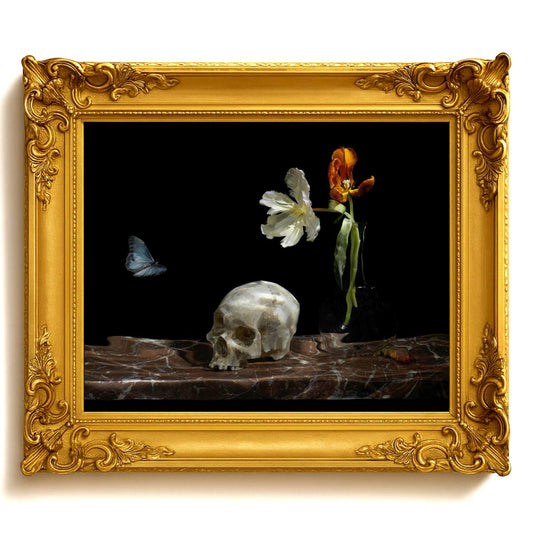 Decorative still life with skull, flowers, and butterfly in a gold frame.