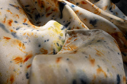 Eco-conscious floral silk scarf with soft sheen