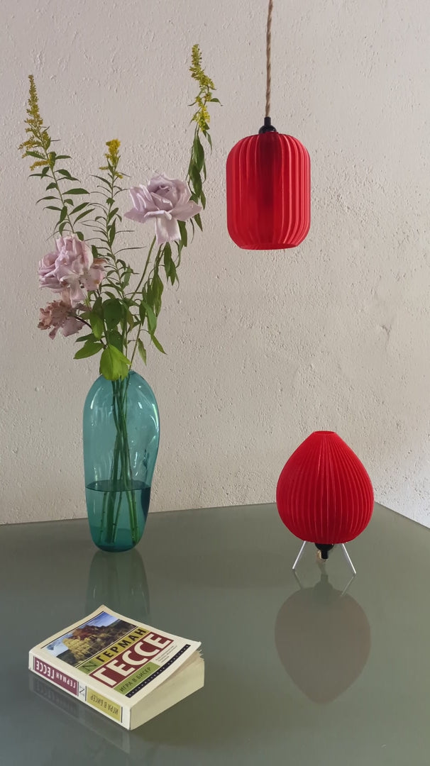 Red Vortex table lamp 3D printed from recycled plastic