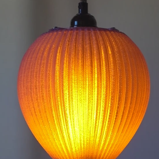 Unique sustainable pendant light supporting artists
