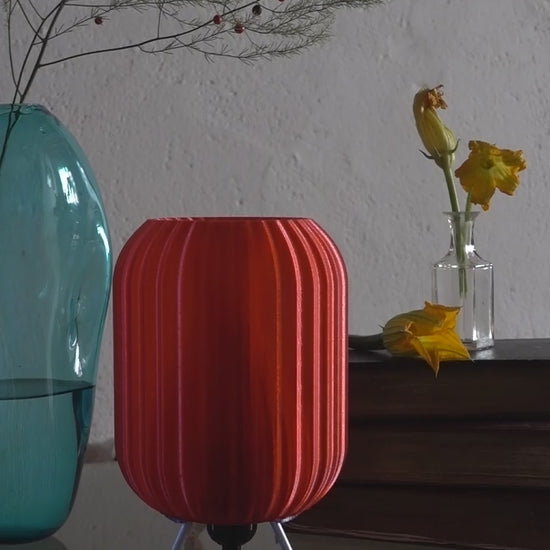 Unique red 3D printed table light with sculptural appeal