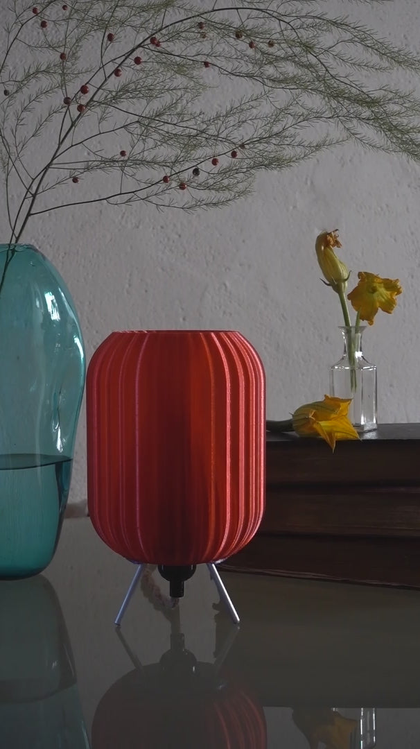 Unique red 3D printed table light with sculptural appeal