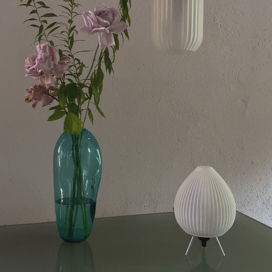 Hand-assembled 3D printed lamp with visible filament
