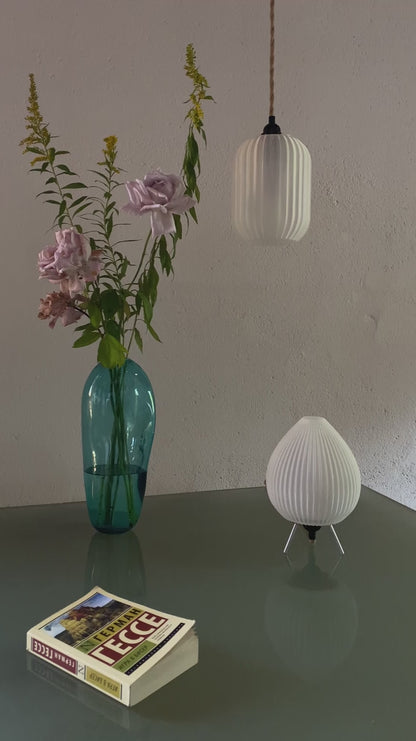Hand-assembled 3D printed lamp with visible filament