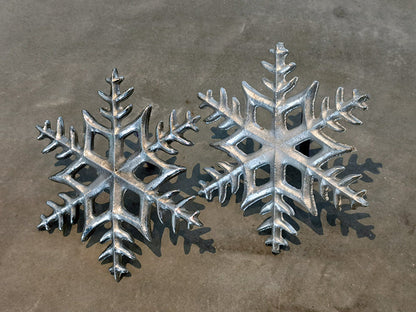Hand-cast snowflake wind chime with leather hanger
